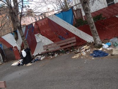 trash can overflowing with trash at Lemon St