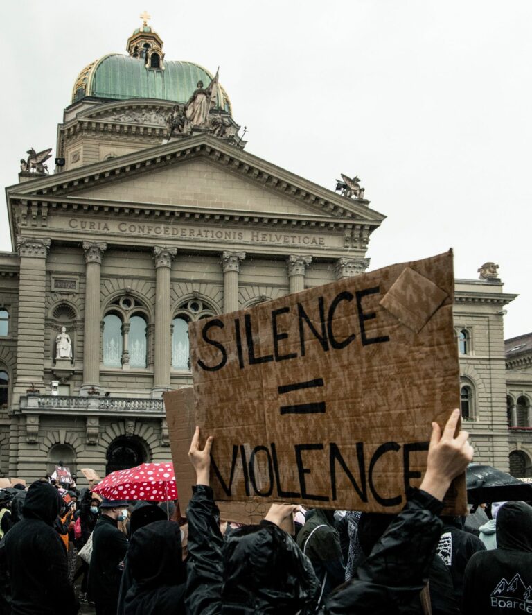 Silence = Violence sign