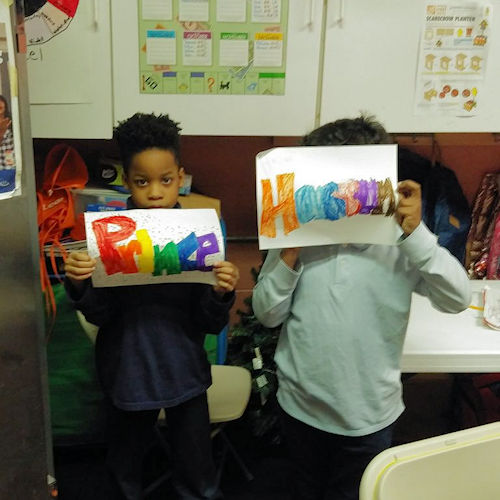 Children with their artwork