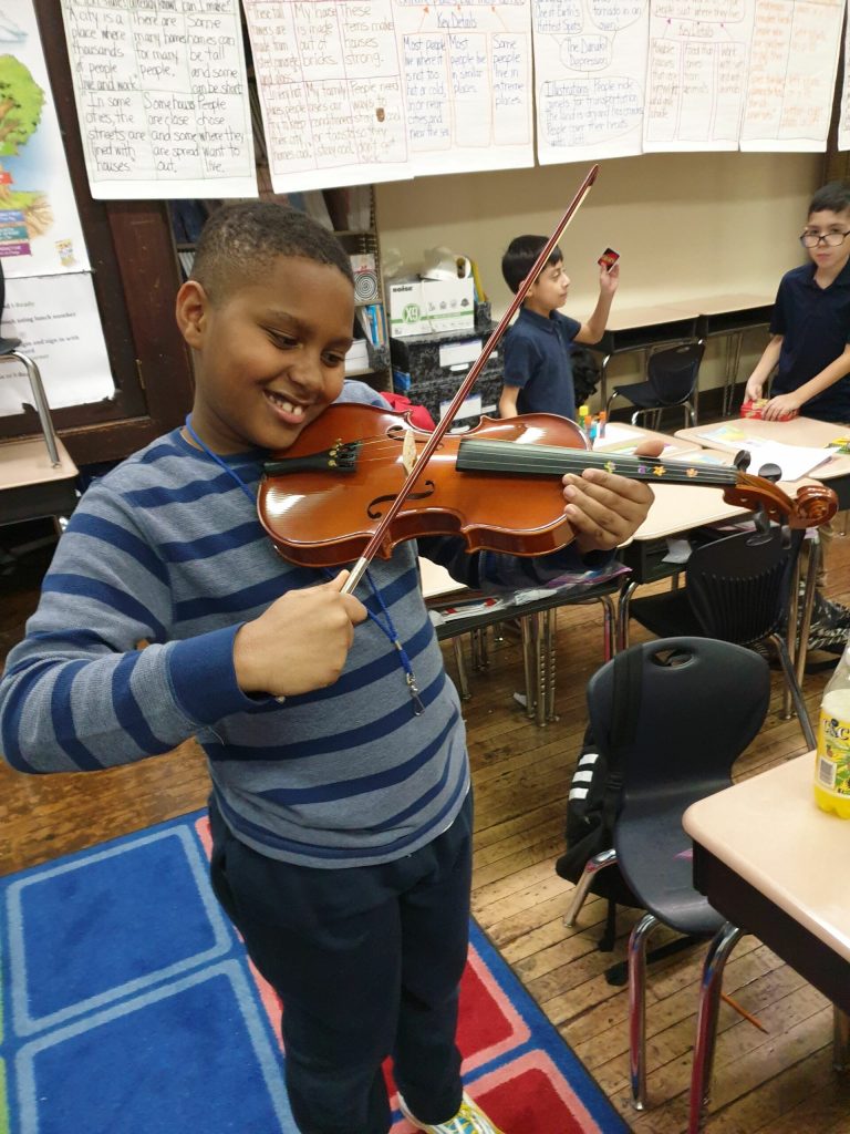 Child playing violin