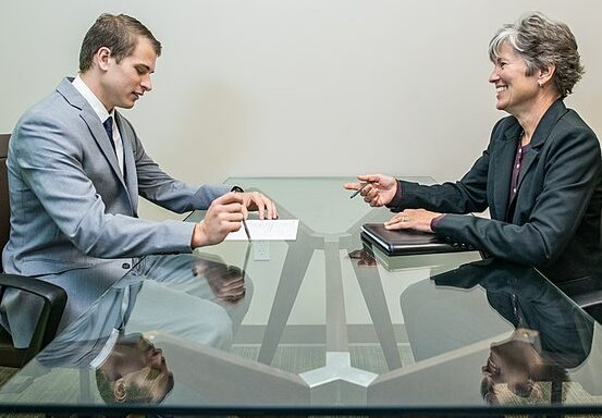Man and woman conducting an interview