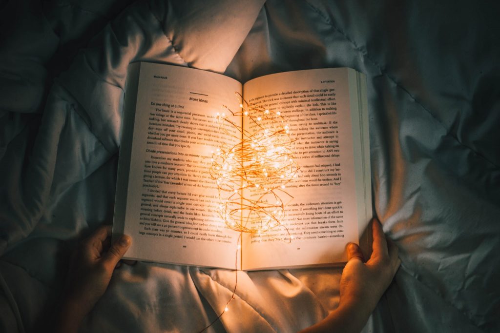Lights hanging over a book