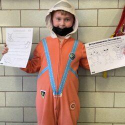 Student wearing astronaut