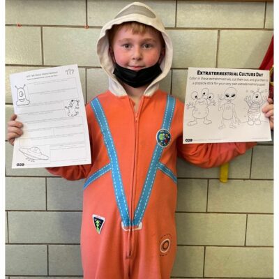 Student wearing astronaut