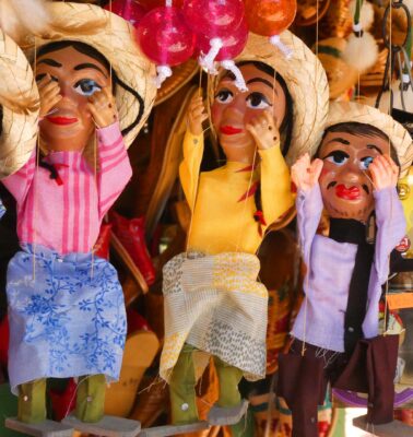 Mexican marionette string puppets hanging on display