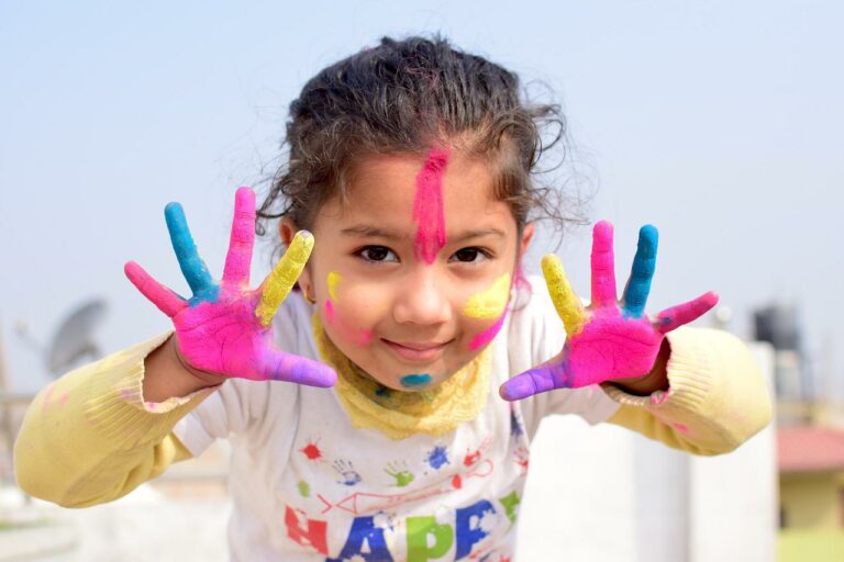 Girl playing with paints