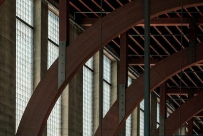 Round partial arch's hanging from ceiling (buttress)