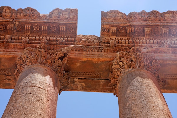 Ancient columns with acanthus leaves carved out in the top