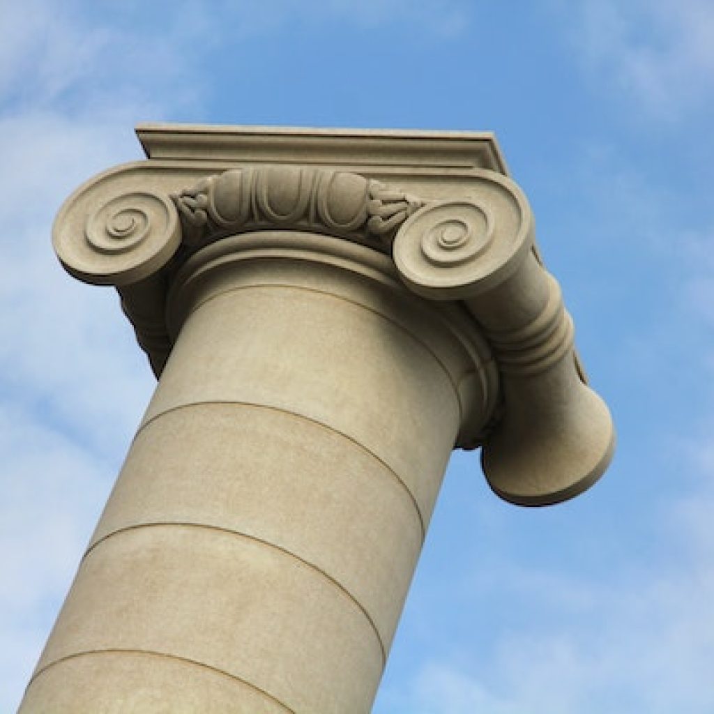 The top of a column with ionic designed top.