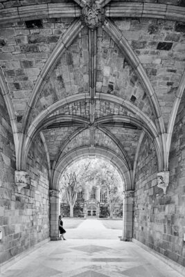 Hallway with tall arches that meet together at the center