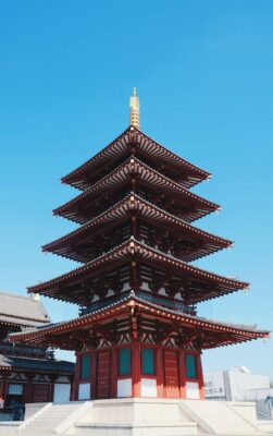 5 story pagoda with red exterior facade