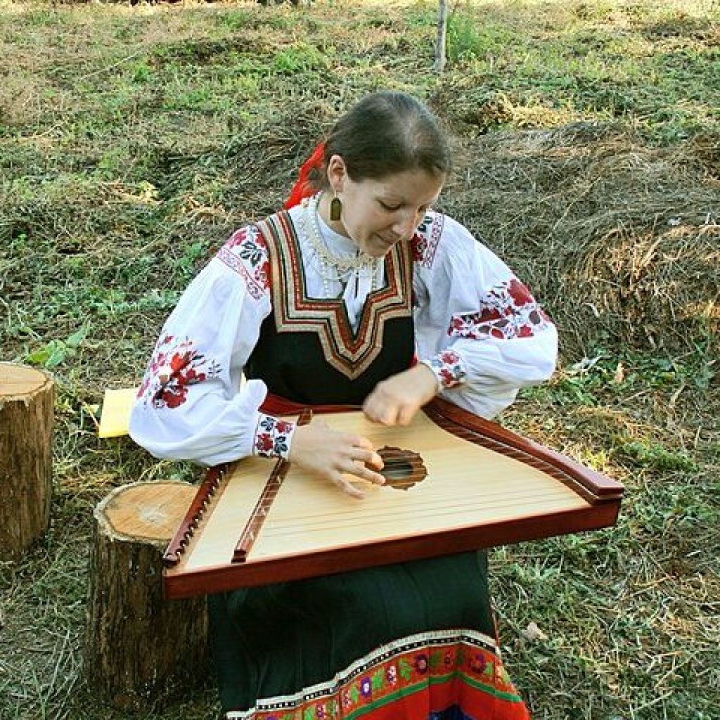 Gusli being played by woman