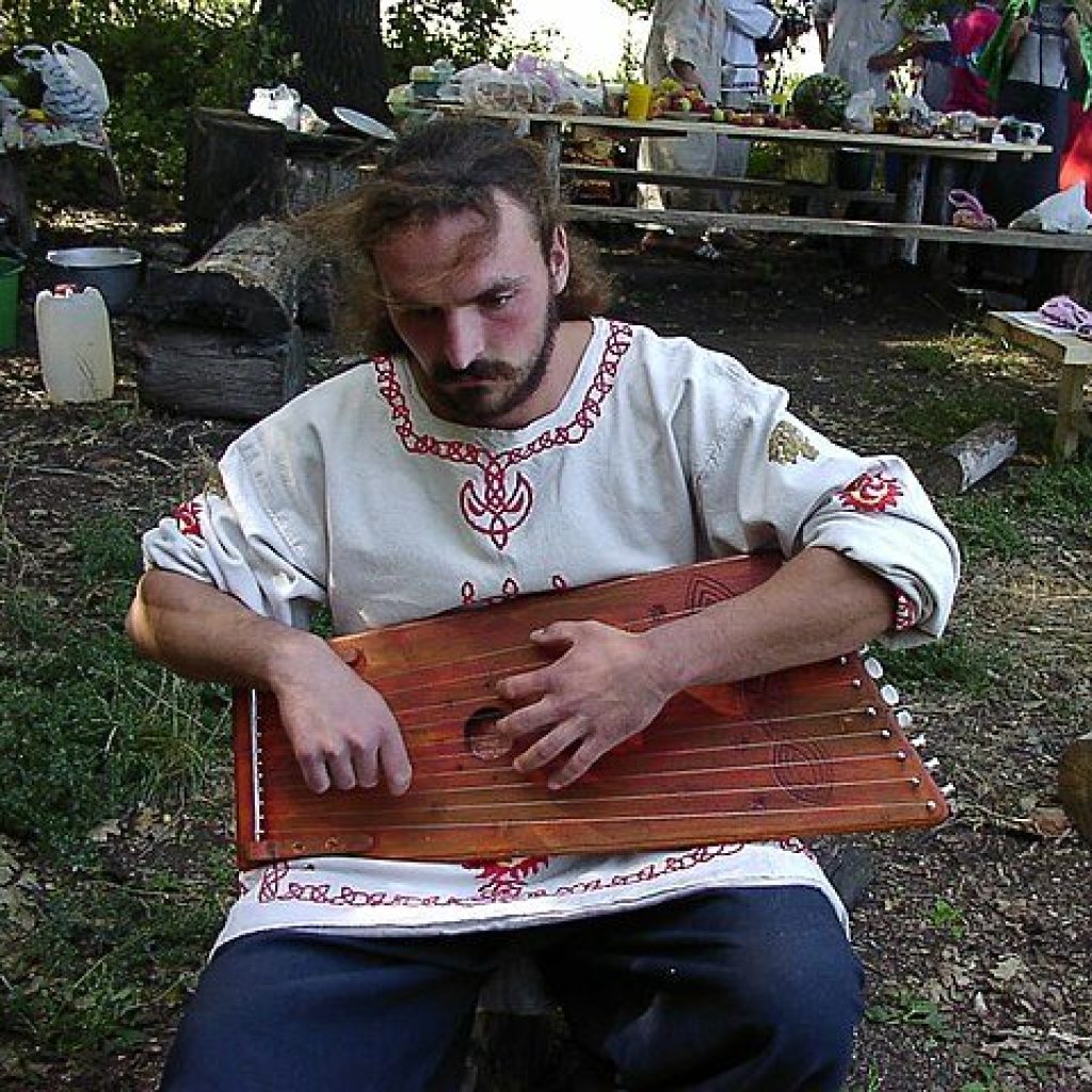 Gusli being played by man