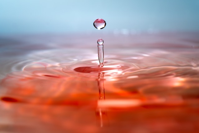 Close-up of a drop of water on surface