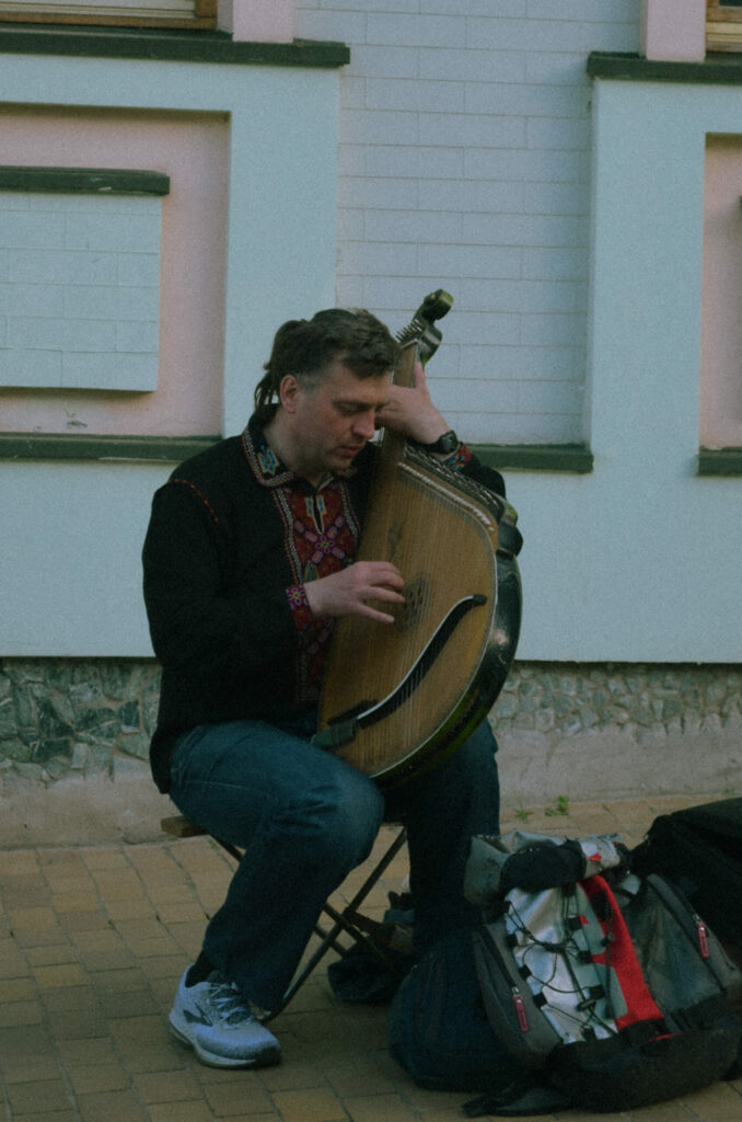Man playing the bandura
