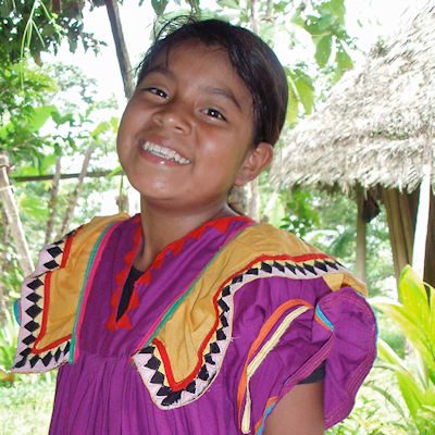Smiling girl in typical Ngöbe dress